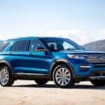 blue ford explorer by lake