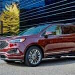 red ford edge parked outside business building